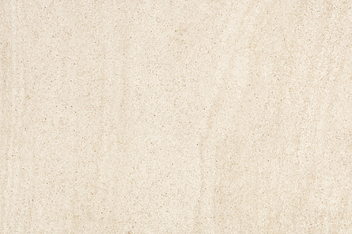 Ceramic porcelain stoneware tile texture or pattern. Natural stone beige color with veining