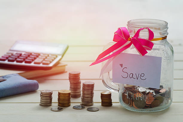 istock pile of money coins, 628877120