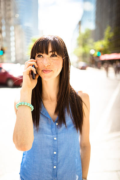 istock woman on the phone in montreal 628882926
