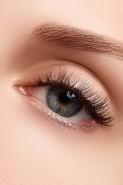 istock Shot of woman's beautiful eye with extremely long eyelashes 628884100