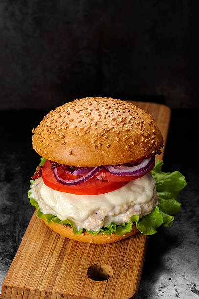 istock Fresh homemade burger with chicken cutlet, tomato sauce and mozz 628884310