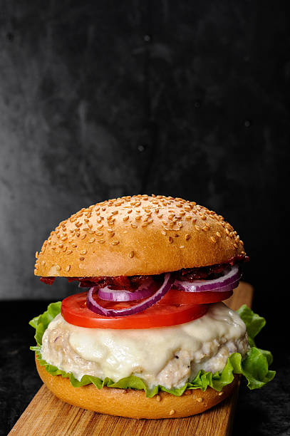 istock Fresh homemade burger with chicken cutlet, tomato sauce and mozz 628884336