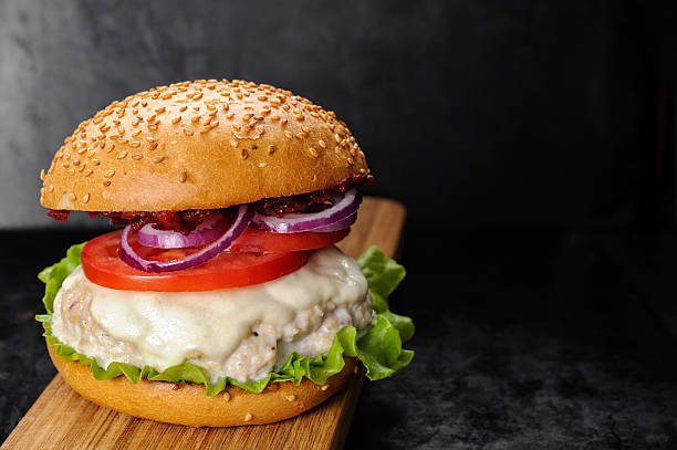 istock Fresh homemade burger with chicken cutlet, tomato sauce and mozz 628884376