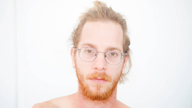 istock portrait of handsome young red-haired man with beard 628885922