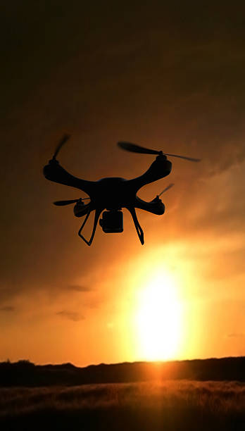 istock 3d render quadrocopters silhouette in the background. radio-cont 628896312