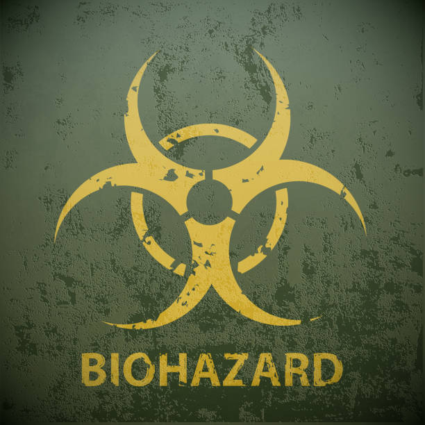 istock Yellow biohazard symbol on a green military background. 628896472