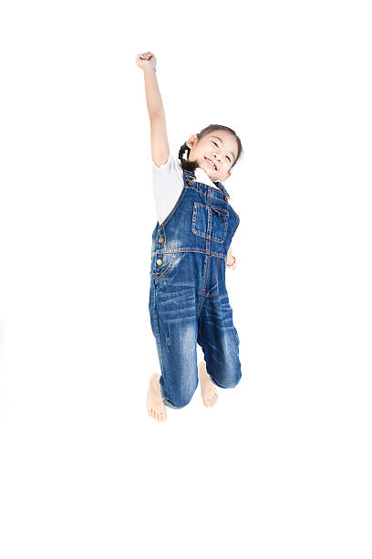 istock Asian cute child is jumping 628896714