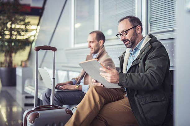 istock People at the airport lounge 628897496