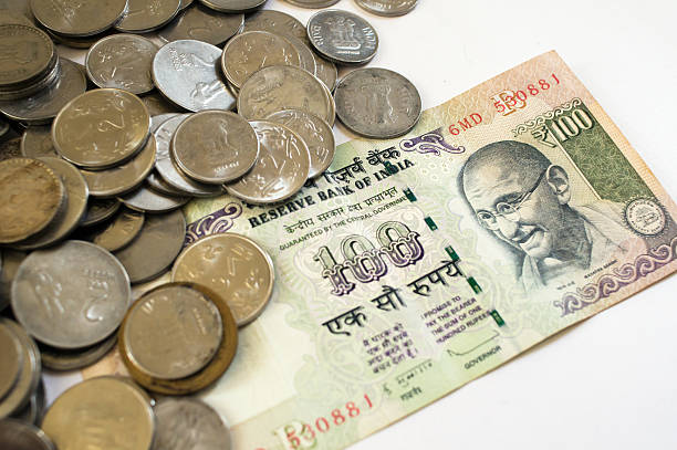 istock Indian money coins and paper on white 628900954