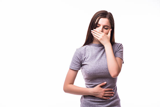 istock sick woman about to chuck, throw up, 628909226