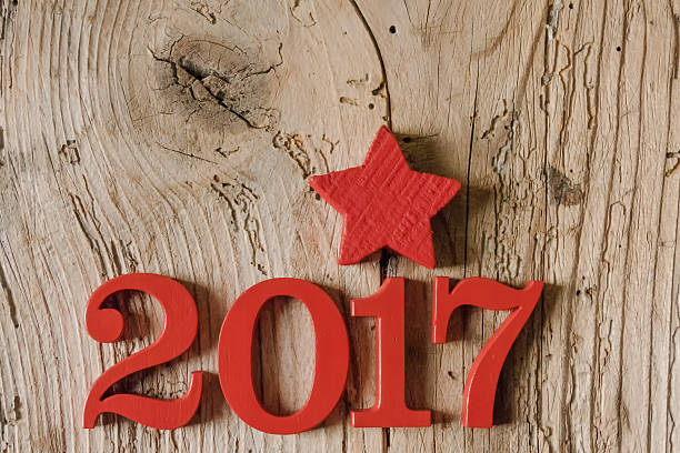 istock Happy new year 2017 against wooden background 628914106