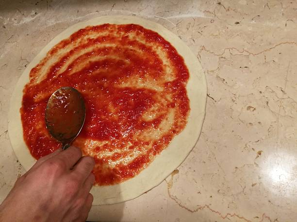 istock preparation of pizza 628914178
