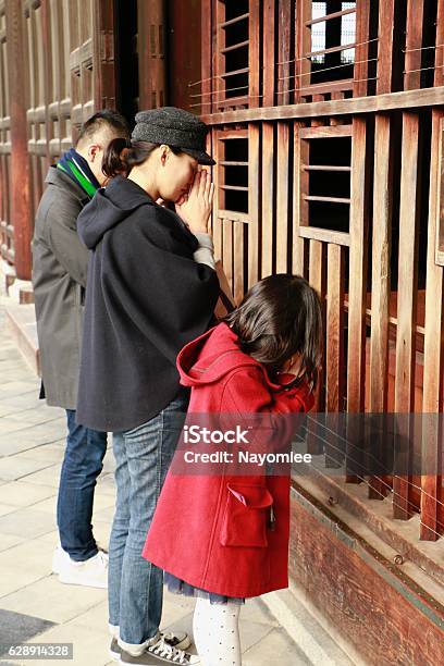 Family Praying At Tofukuji Temple Stock Photo - Download Image Now - Adult, Child, Daughter