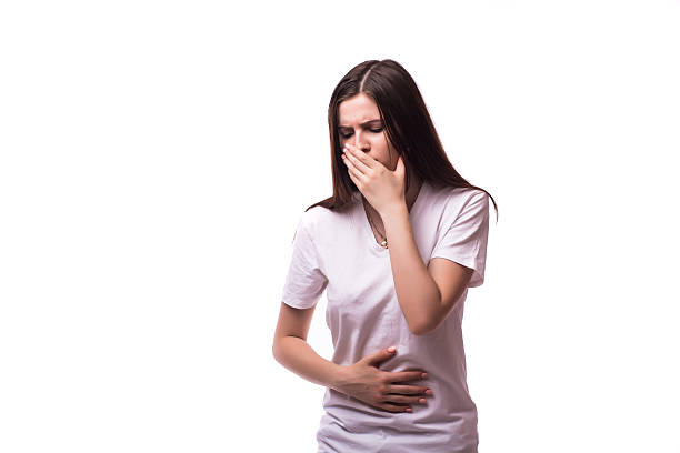 istock sick woman about to chuck, throw up, 628914700