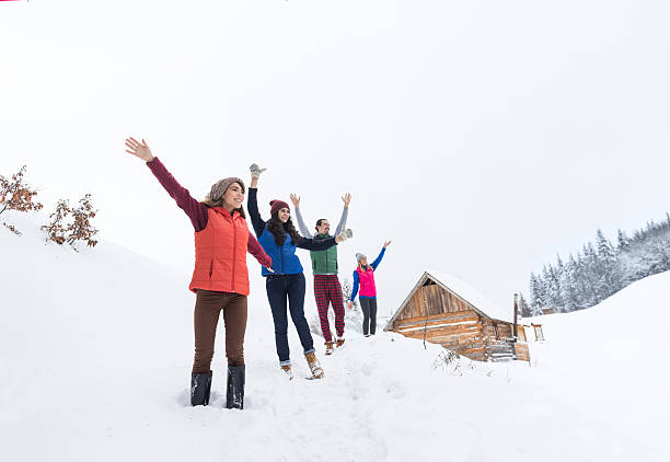 istock Friends On Mountain Top Winter Snow Forest, Young People Group 628917138