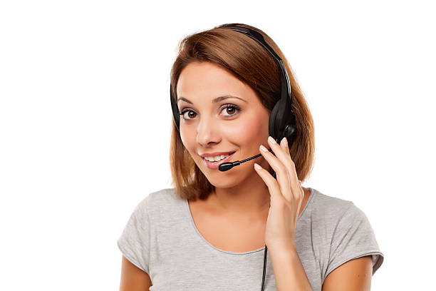 istock attractive young woman with headset on her head 628917176