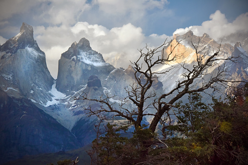 dramatic evening light in a gathering storm over the Andean peaks of Torres del Paine