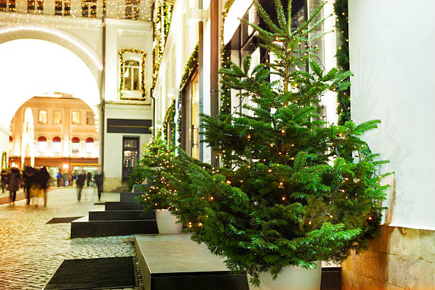 istock Square decorated with garlands and Christmas trees 628925830