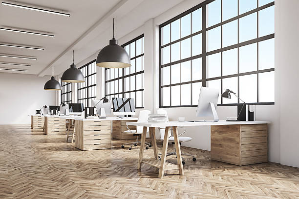 istock Long office with wooden floor 628931736