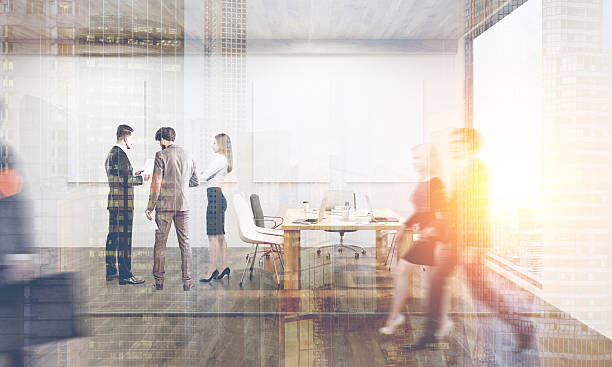 istock People in office with four posters, toned 628932120