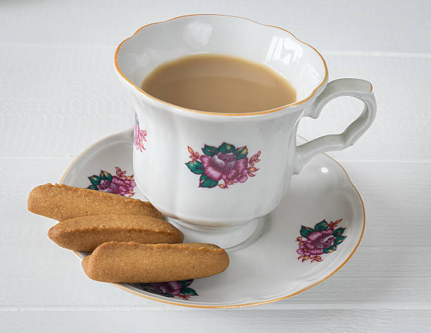 istock Gingerbread cookies with coffee on a  wooden table. 628932180