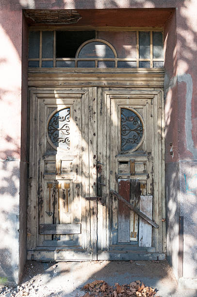 istock Doors of old abandoned house 628933888