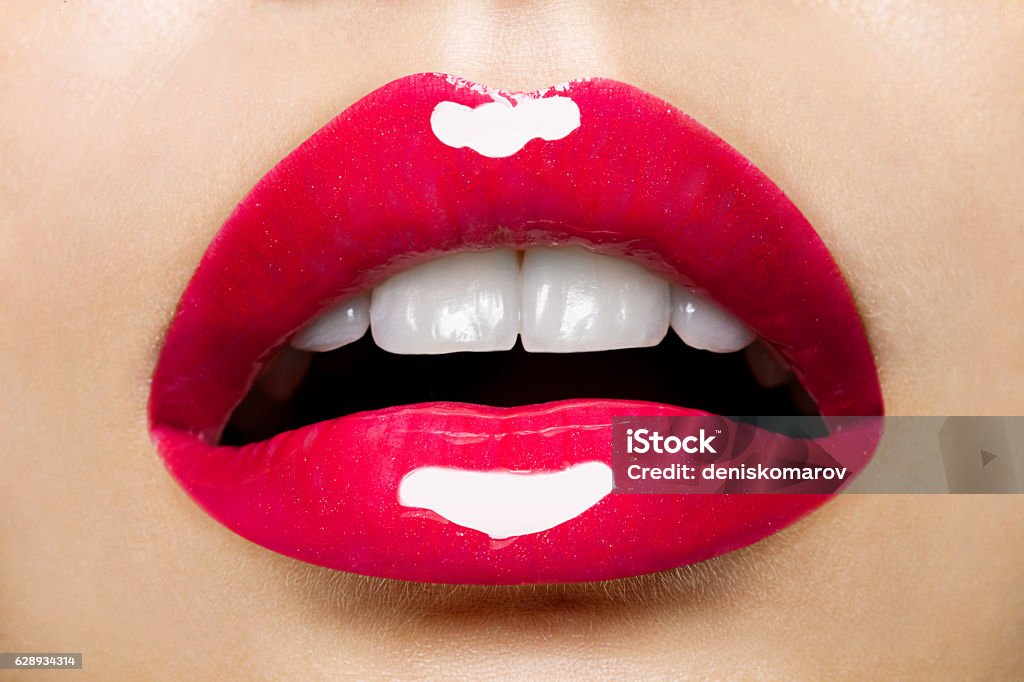 beautiful red female lips with glitter Human Lips Stock Photo