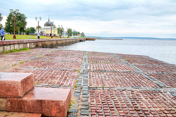 Petrozavodsk, Russia - August 9, 2008: Citizens and tourists on city quay on the shore of Lake Onega