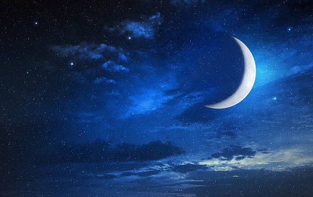 moon in blue cloudy sky moon in a starry and cloudy sky crescent stock pictures, royalty-free photos & images