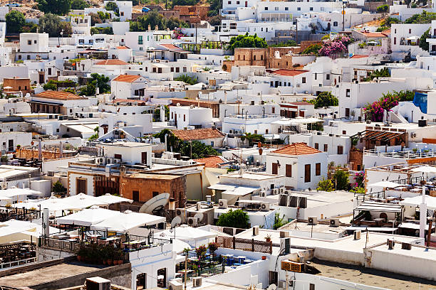 Beautiful view from height on white stone town of Lindos, Greece