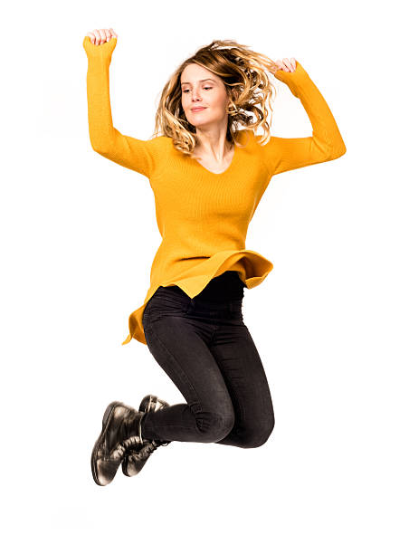 beautiful woman on white background jumping happiness