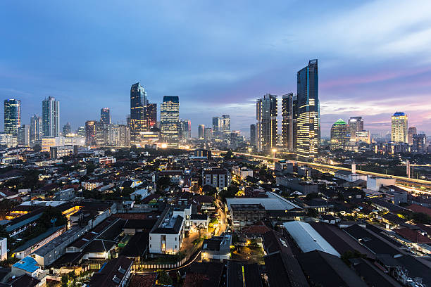 Dramatic sunset over Jakarta, Indonesia capital city. stock photo