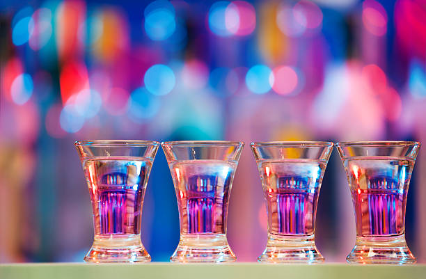 istock Burning drinks in shot glasses on a bar counter 628947510