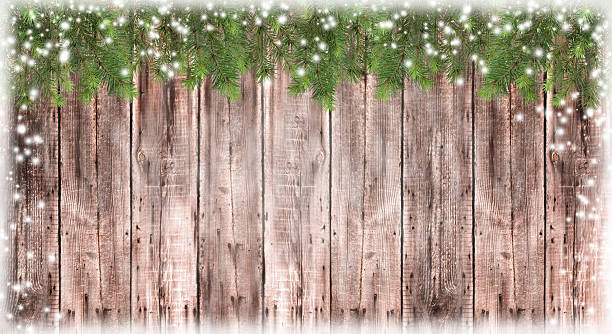 istock Blurred wood texture. Christmas tree in the snow. Background. 628948090