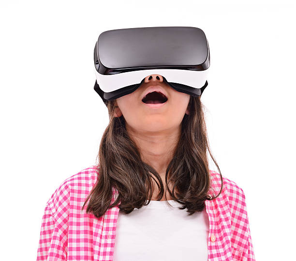istock Little girl wearing vr headset 628949110