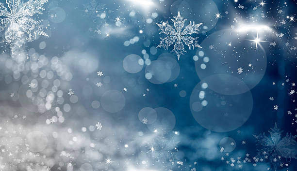 istock Blue holiday abstract background with stars and snowflakes 628951032