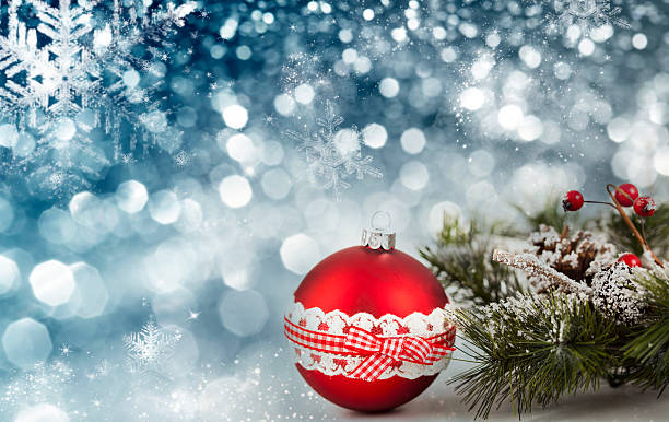 istock Red Christmas balls over sparkling holiday background 628951208