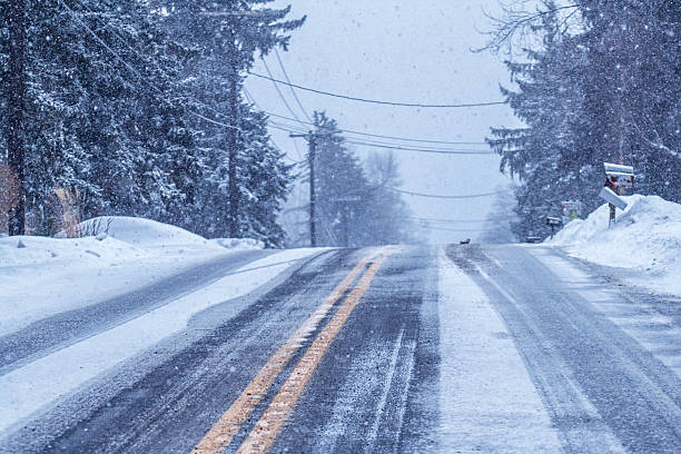 istock Car Driver POV Blizzard Snow Winter Rural Highway Hillcrest 628951756