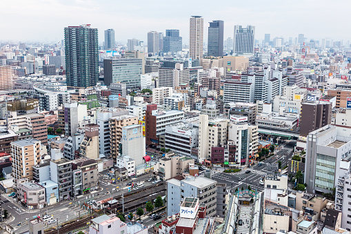 Osaka, Japan - August 4, 2015: An aerial view of Osaka skyline with its busy life in Japan third largest city in Kansai province.