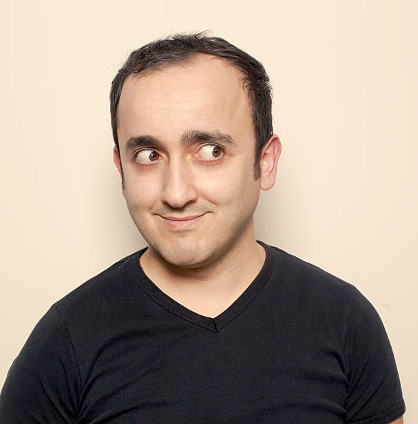 istock Young man making facial expressions 628963644