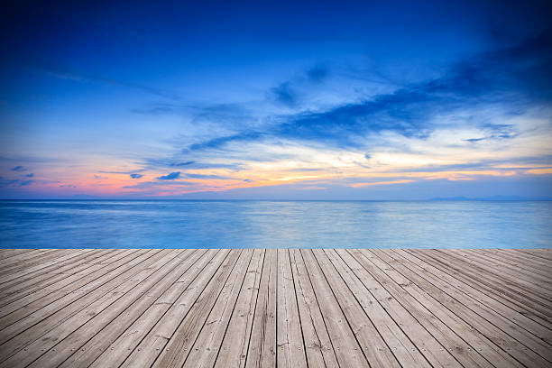 istock Wooden board towards sea 628976258