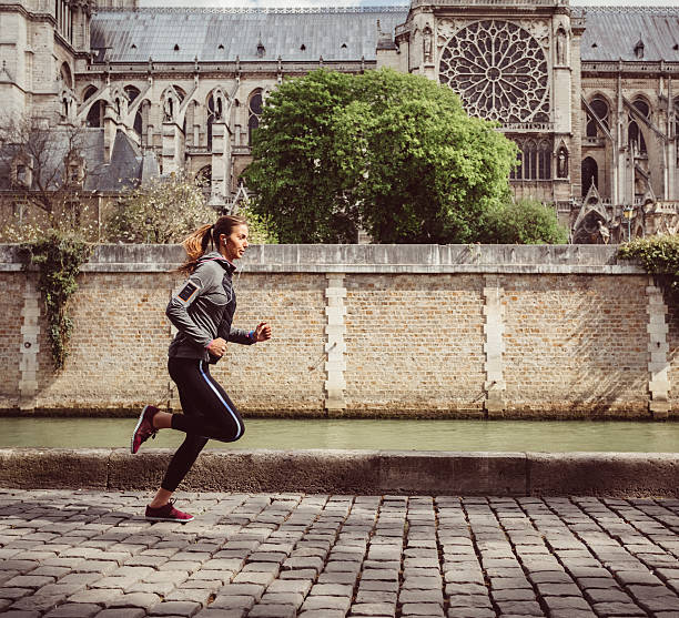 istock Sports woman jogging in Paris 628976586