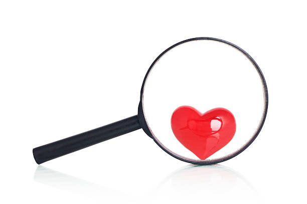 istock Magnifying Glass Show Red Heart 628976738