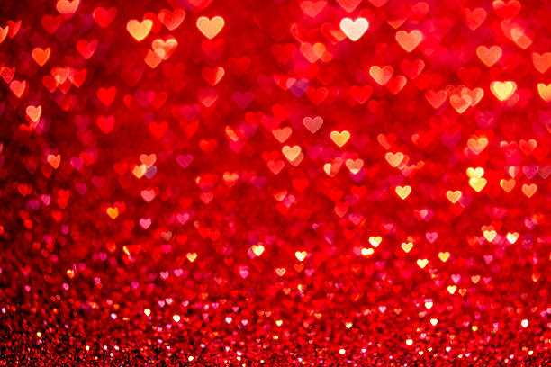 istock Red heart bokeh background. Valentines day texture. 628978066