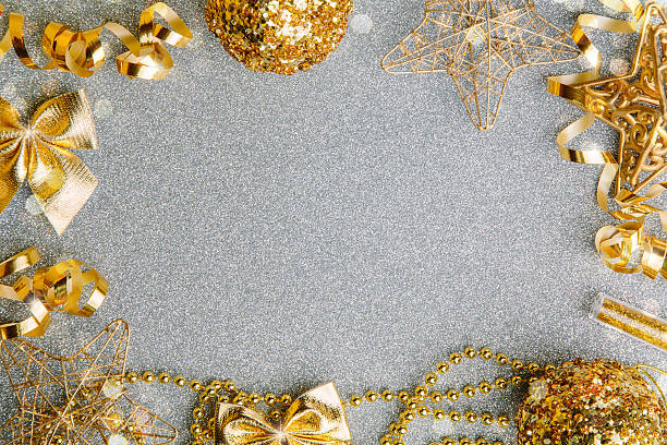 istock Golden Christmas decorations on glitter background 628979112