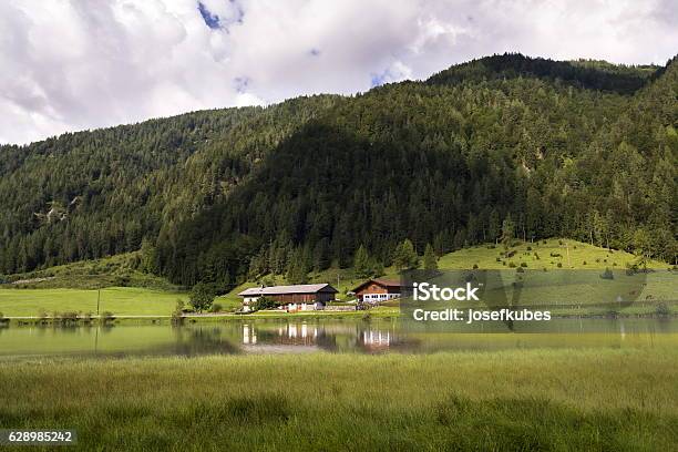 Lake Pillersee With Farmhouse In Sankt Ulrich Am Pillersee Austria Stock Photo - Download Image Now