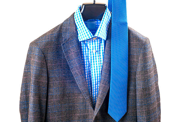 istock shirts on hangers. men's suit 628986314