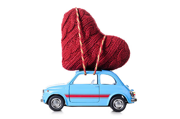 istock Retro toy car with Valentine heart 628993038