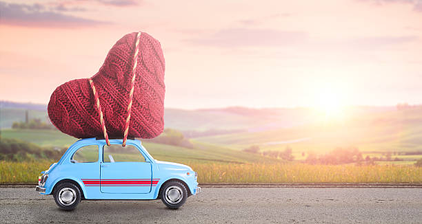 istock Retro toy car with Valentine heart 628993112