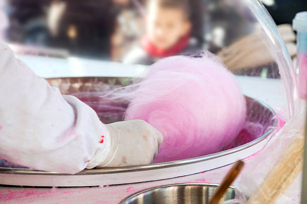 Caroline 945 Afbrydelse Man Doing Cotton Candy Stock Photo - Download Image Now - Cotton Candy,  Making, Machinery - iStock